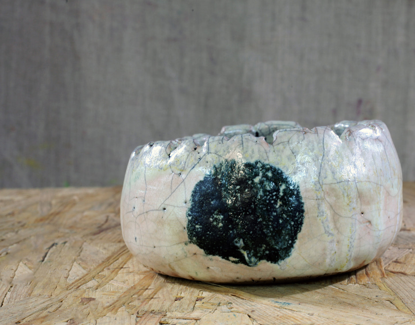 Thumb pot n.1 with spot RAKU