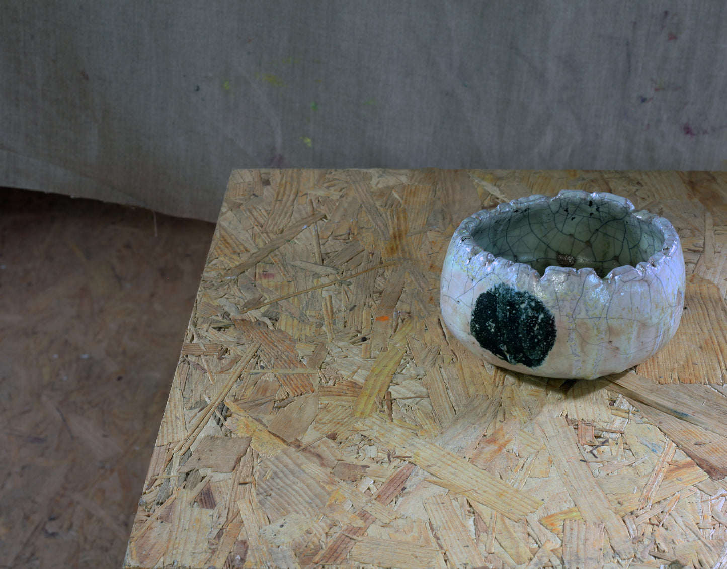 Thumb pot n.1 with spot RAKU