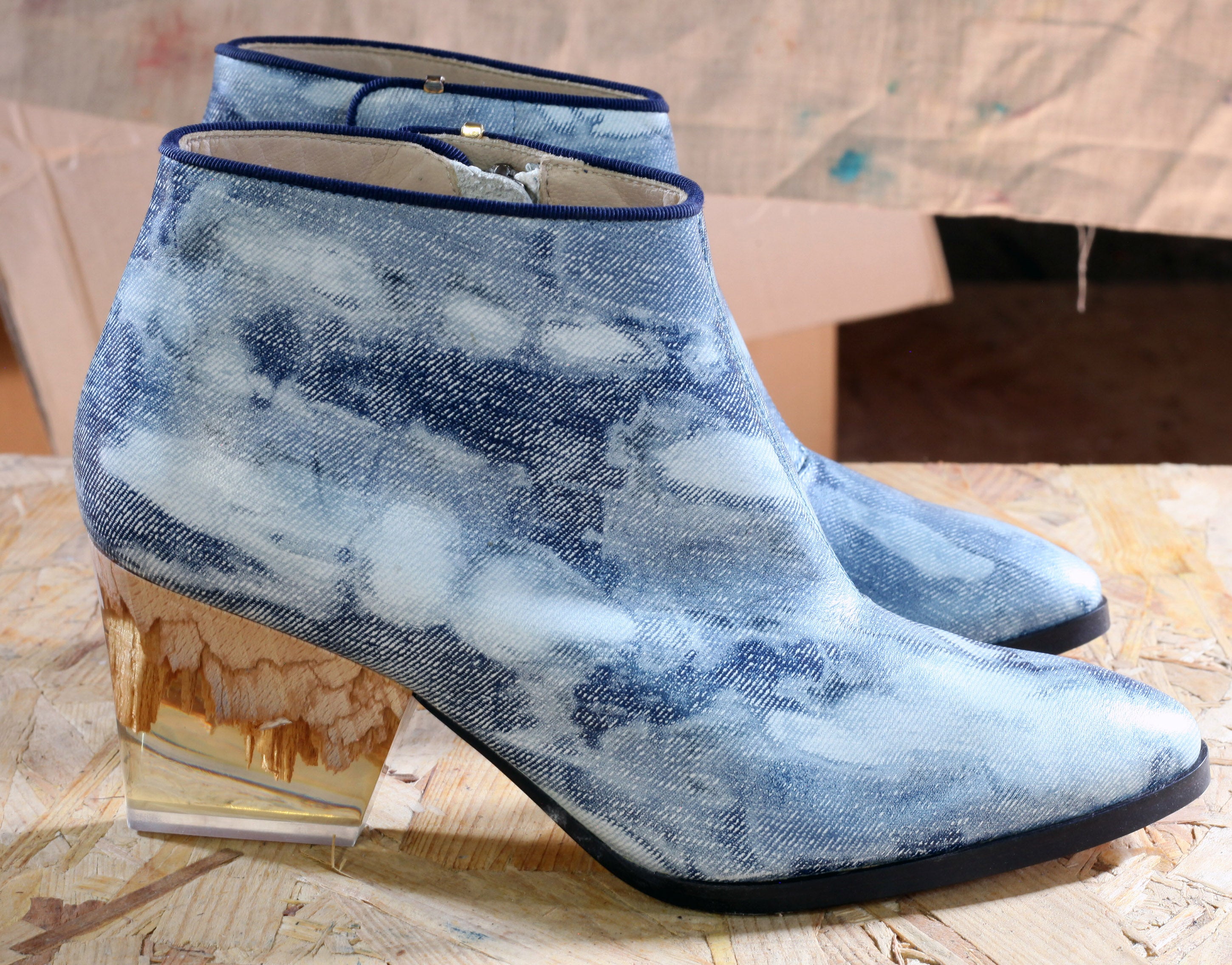 The Pollock in denim print with plexiglass glass and wood heel.