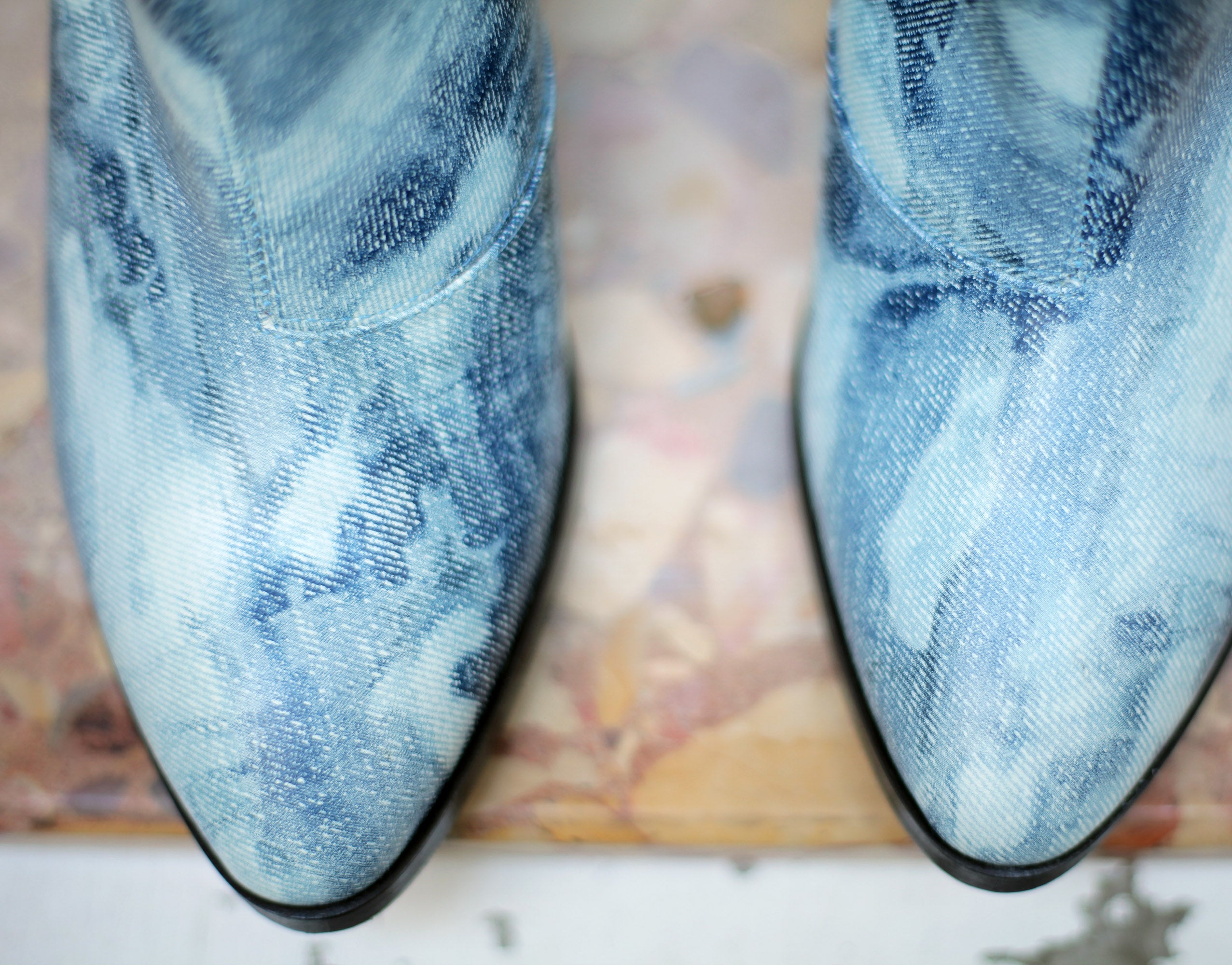 The Pollock in denim print with plexiglass glass and wood heel.